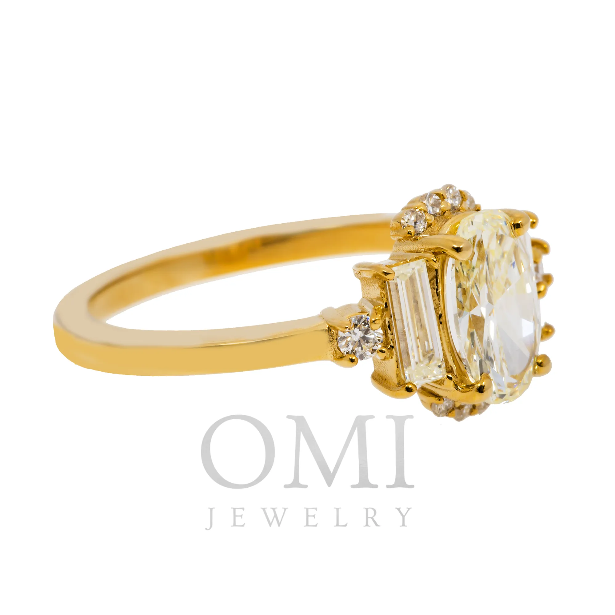 14K GOLD OVAL AND BAGUETTE DIAMOND ENGAGEMENT RING 1.25 CTW all
